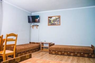 Фото номера Стандартный четырехместный номер Фермерские дома Agroturystyka uDuraja г. Kiczora 4
