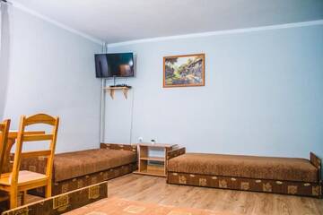 Фото номера Стандартный четырехместный номер Фермерские дома Agroturystyka uDuraja г. Kiczora 5